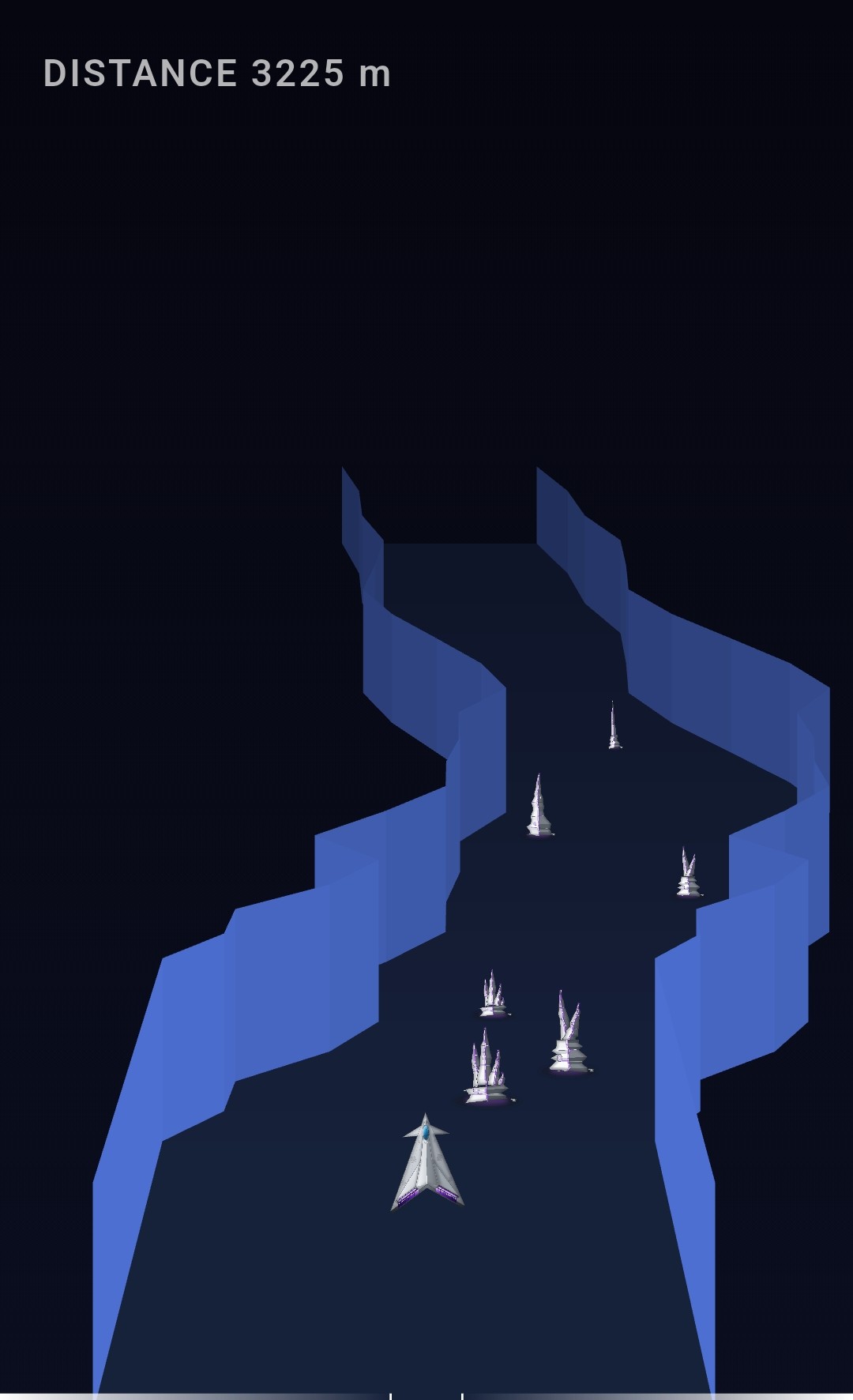 Trench Run Immersion gameplay: a ship weaving between stalagmite formations in a blue-walled canyon